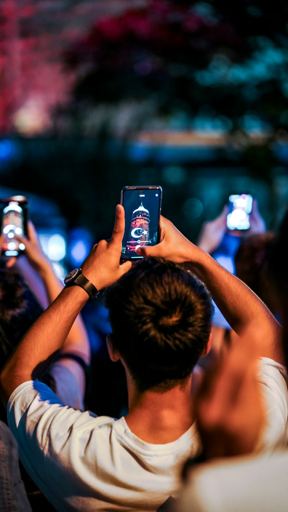 a man holding a cell phone