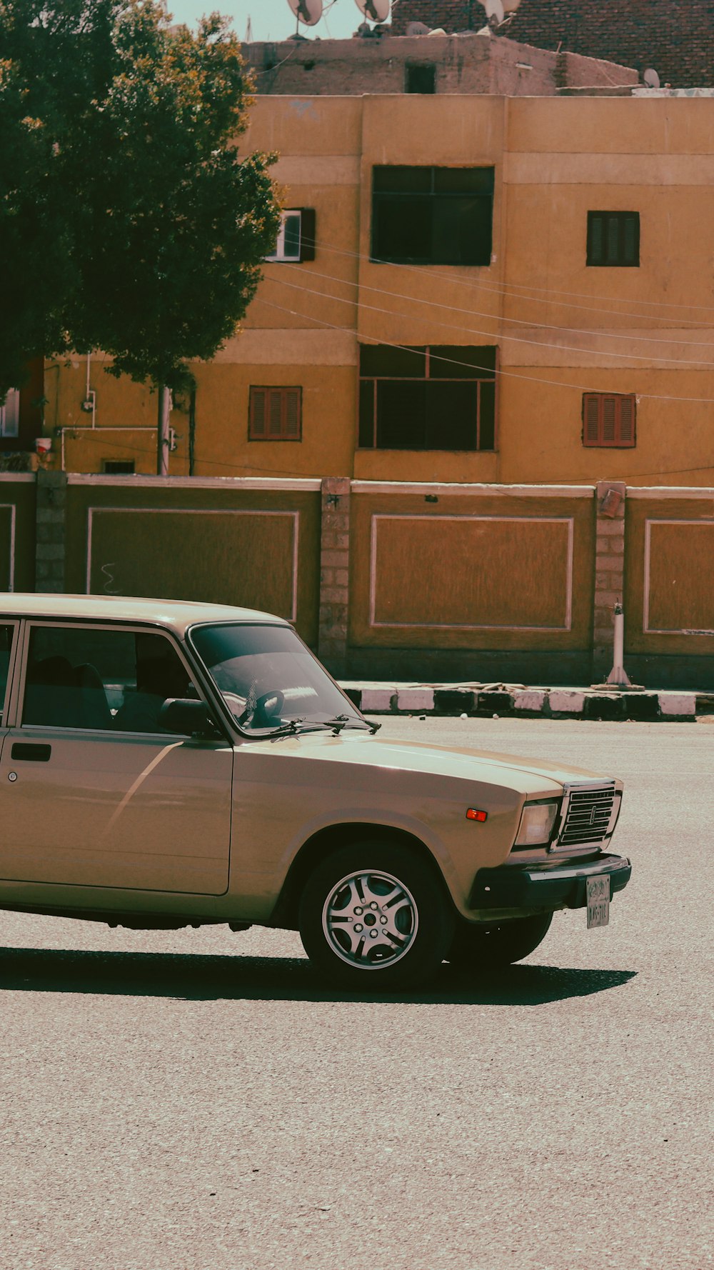 a car parked in front of a building