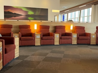 A cozy waiting area with comfortable chairs and warm tones.