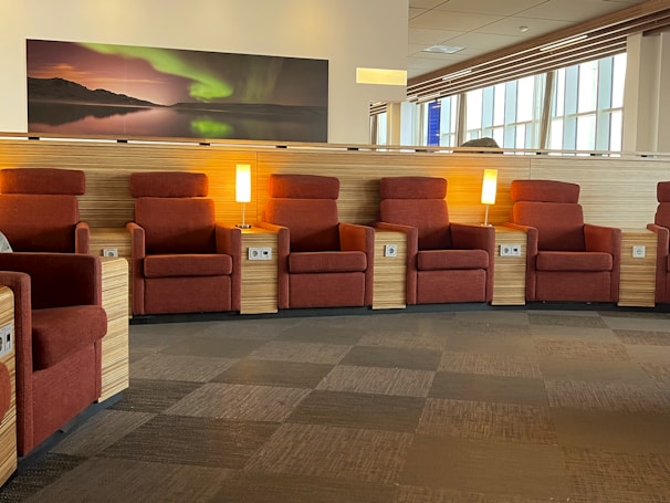 A cozy waiting area with comfortable chairs and warm tones.