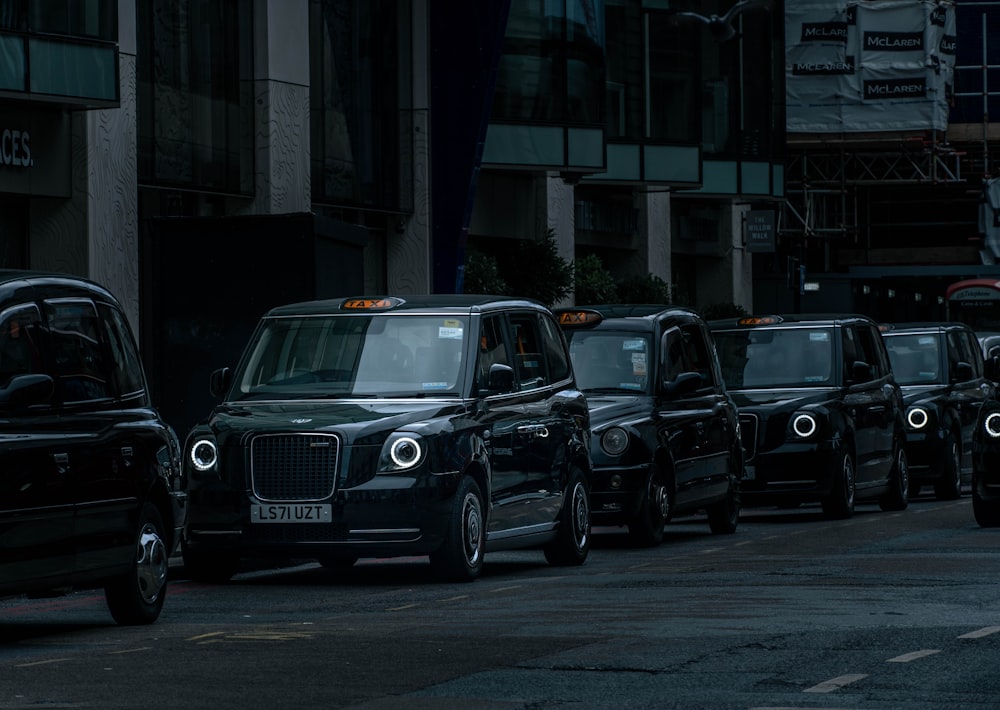 a row of cars on a street