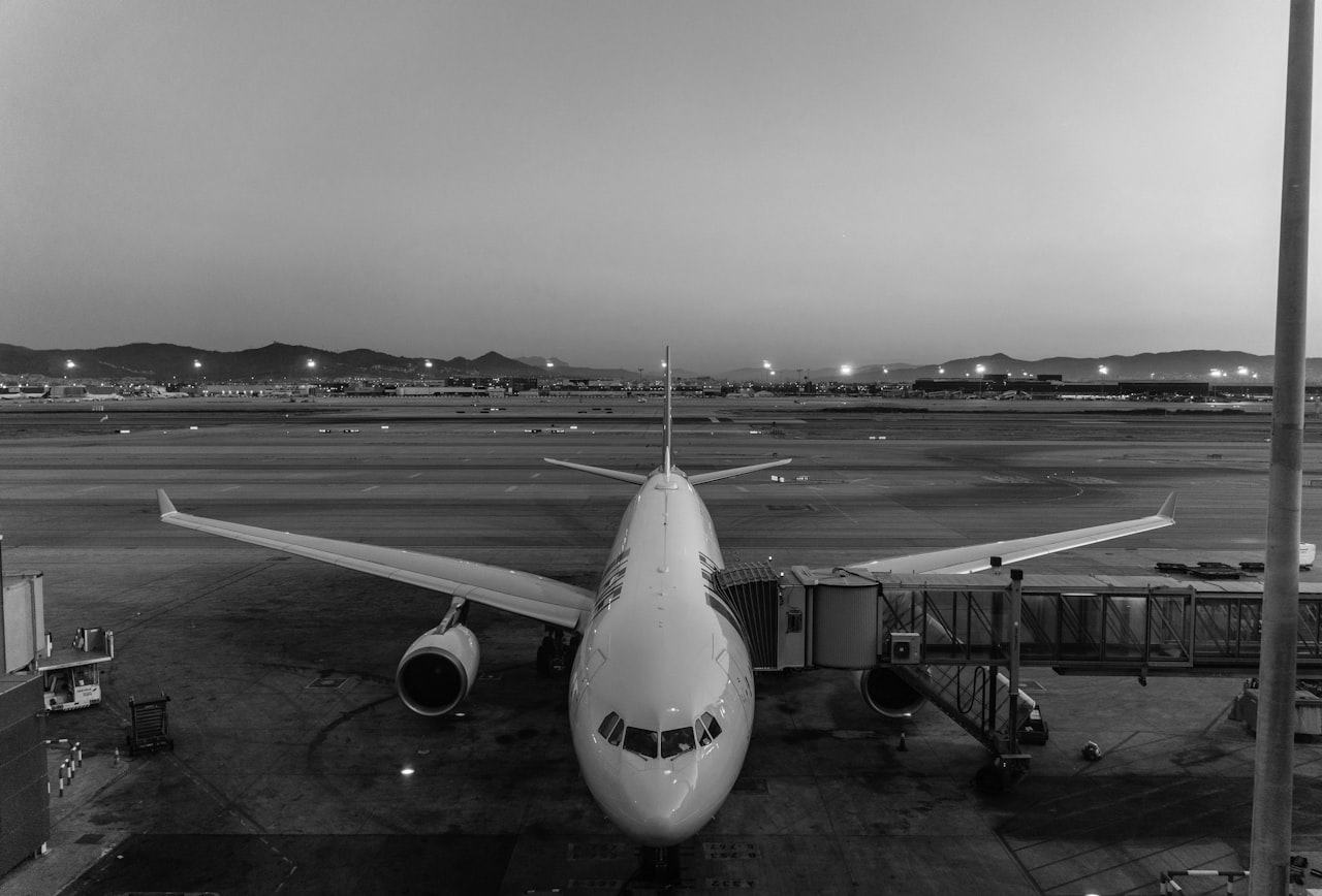 an airplane is parked at the Ariport of Barcelona