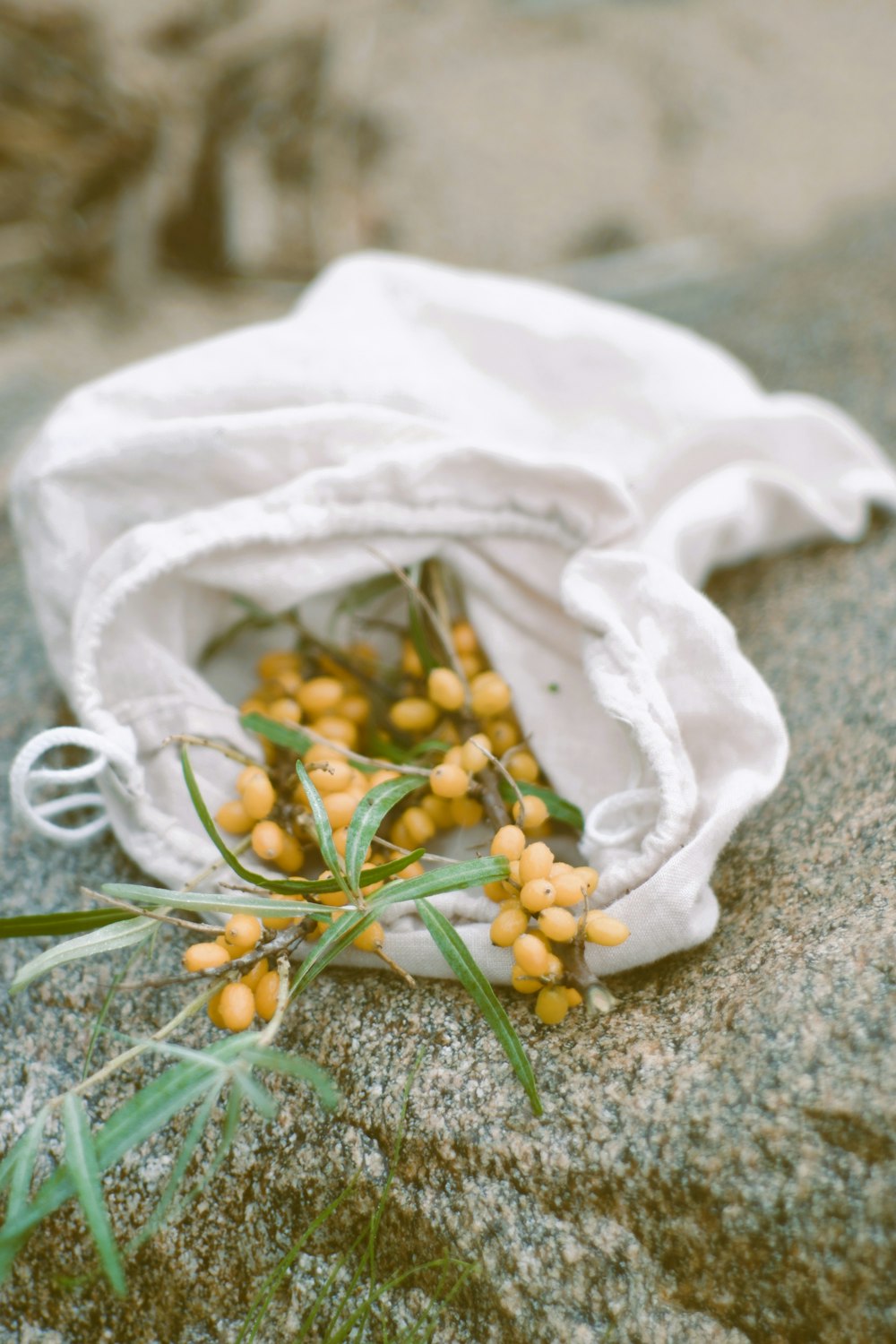 a white bag with white flowers