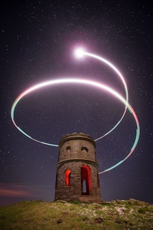 a tower with lights in the sky
