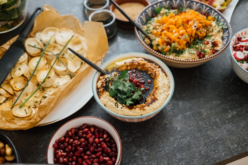 a table with bowls of food