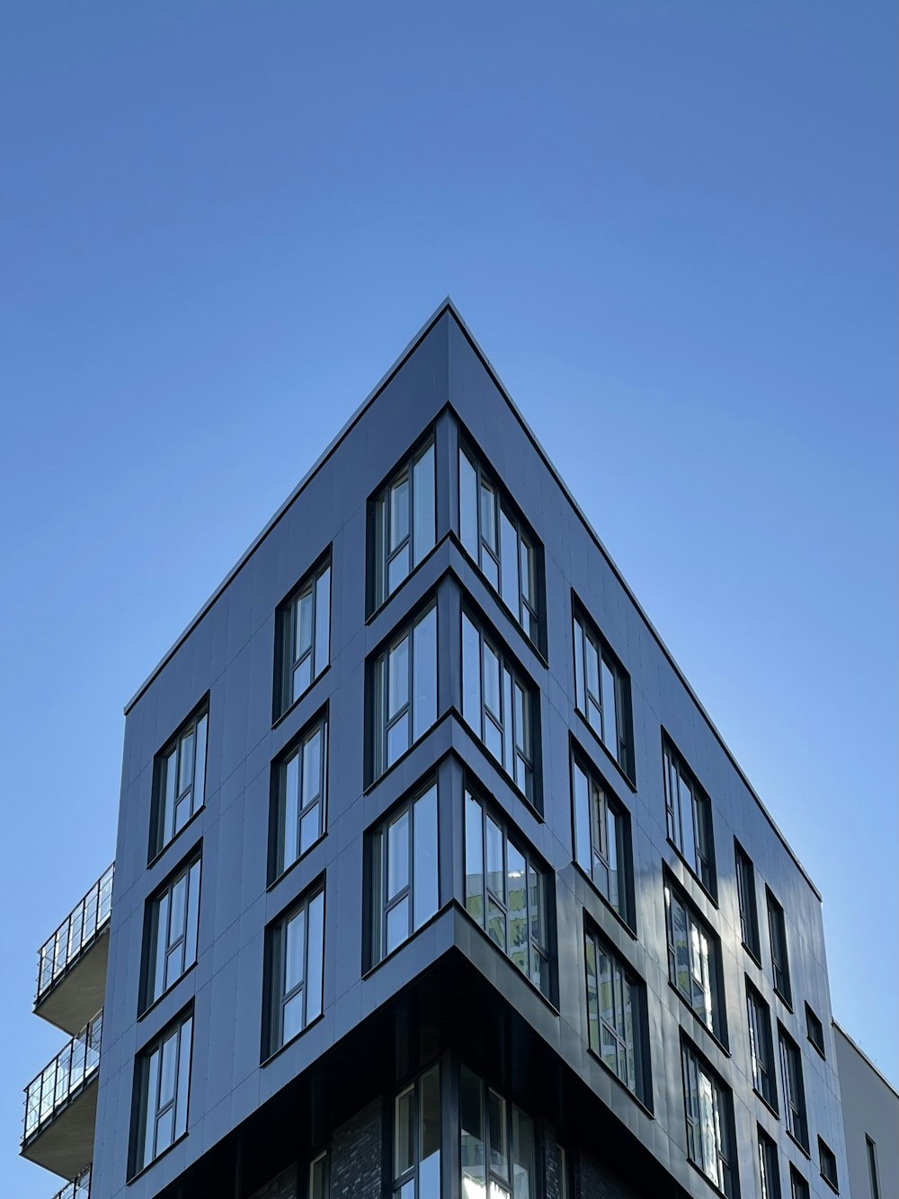 a tall building with balconies