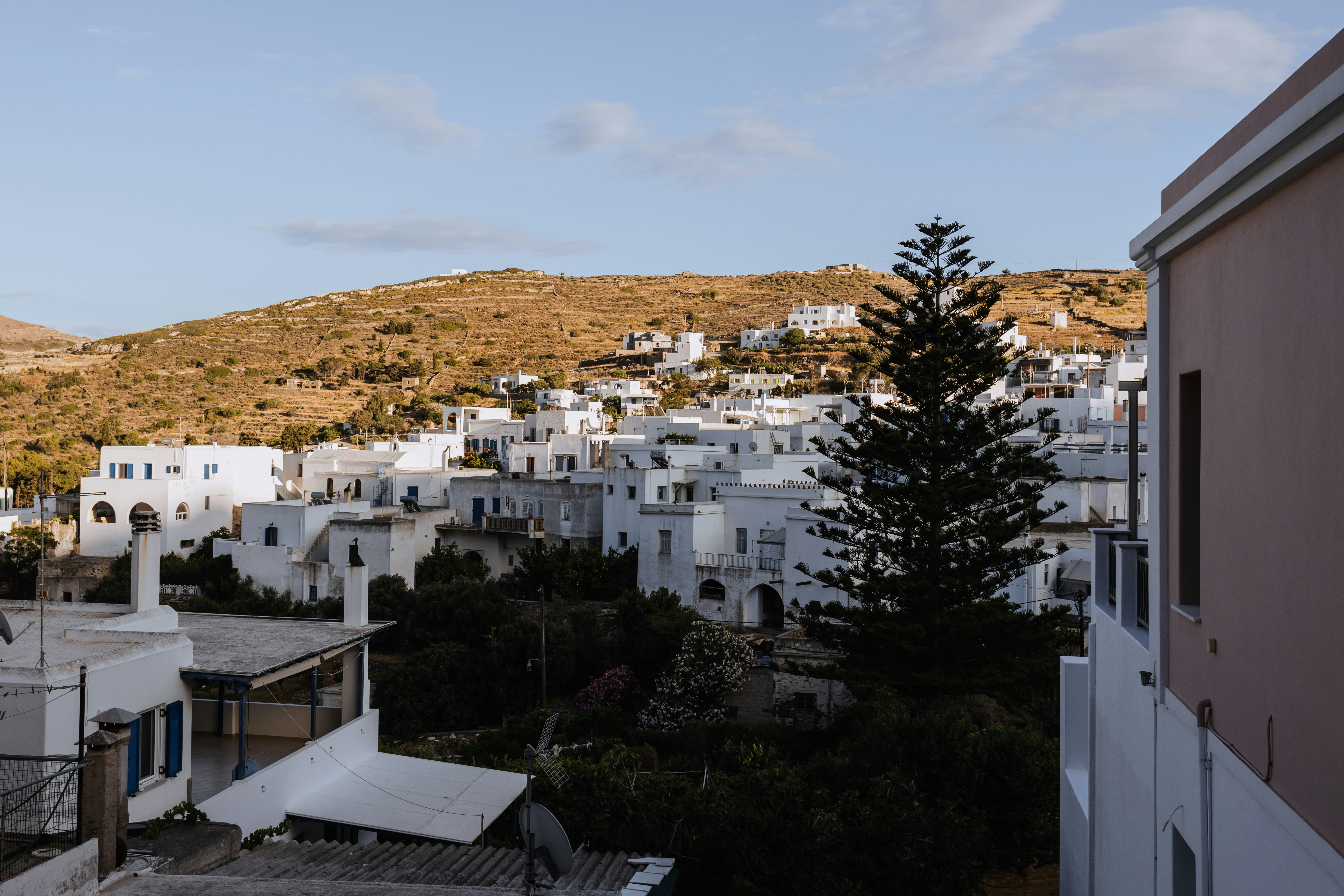 a town with a hill in the background