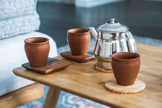 a group of clay pots on a table