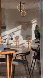 a room with chairs and tables