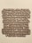 A piece of wall art with text expressing gratitude and appreciation, crafted in a three-dimensional style with brown letters casting shadows against a light wall.