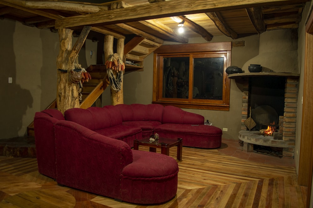 a living room with a red couch