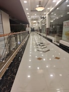 Commercial floor with a gold and blue marble epoxy pattern in a retail space.