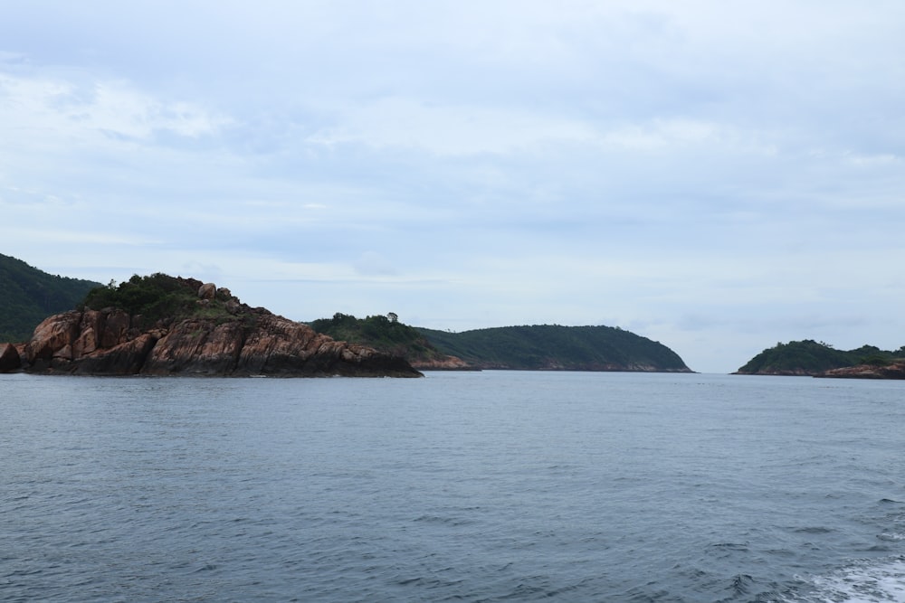 a body of water with land in the distance