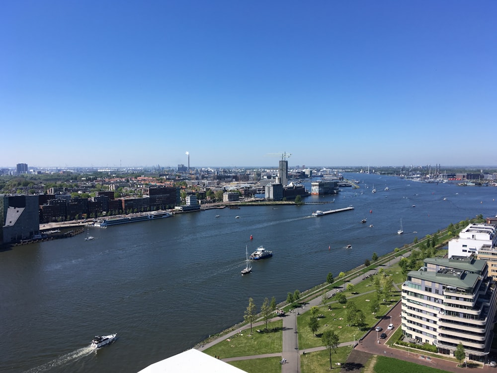 a body of water with boats in it and buildings around it