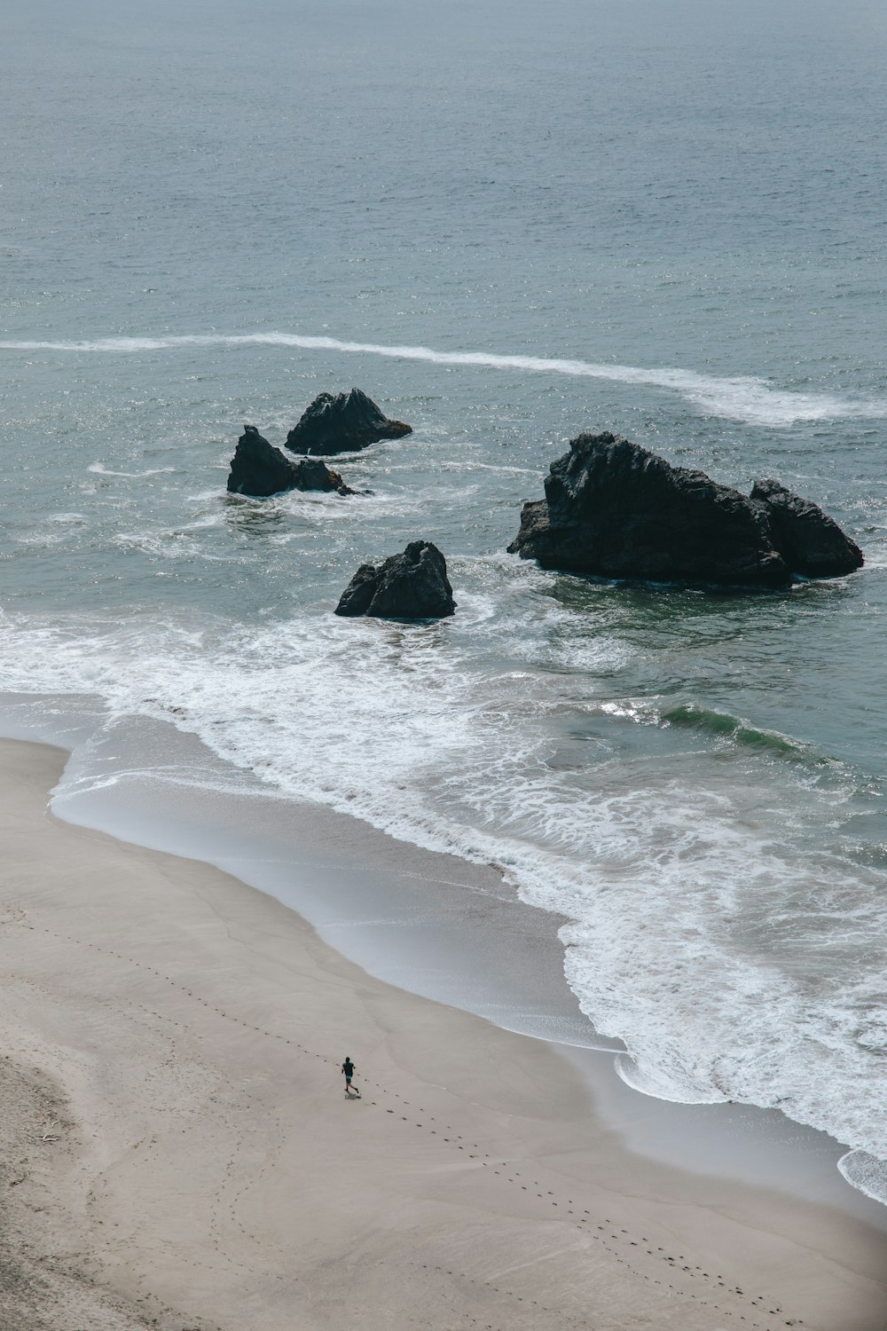 a group of rocks in the ocean