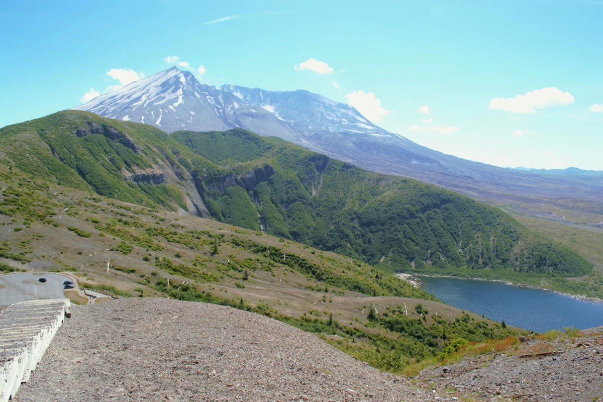 Mount St. Helens and Spirit Lake seen from Windy Ridge, with bare slopes still recovering from the 1980 eruption