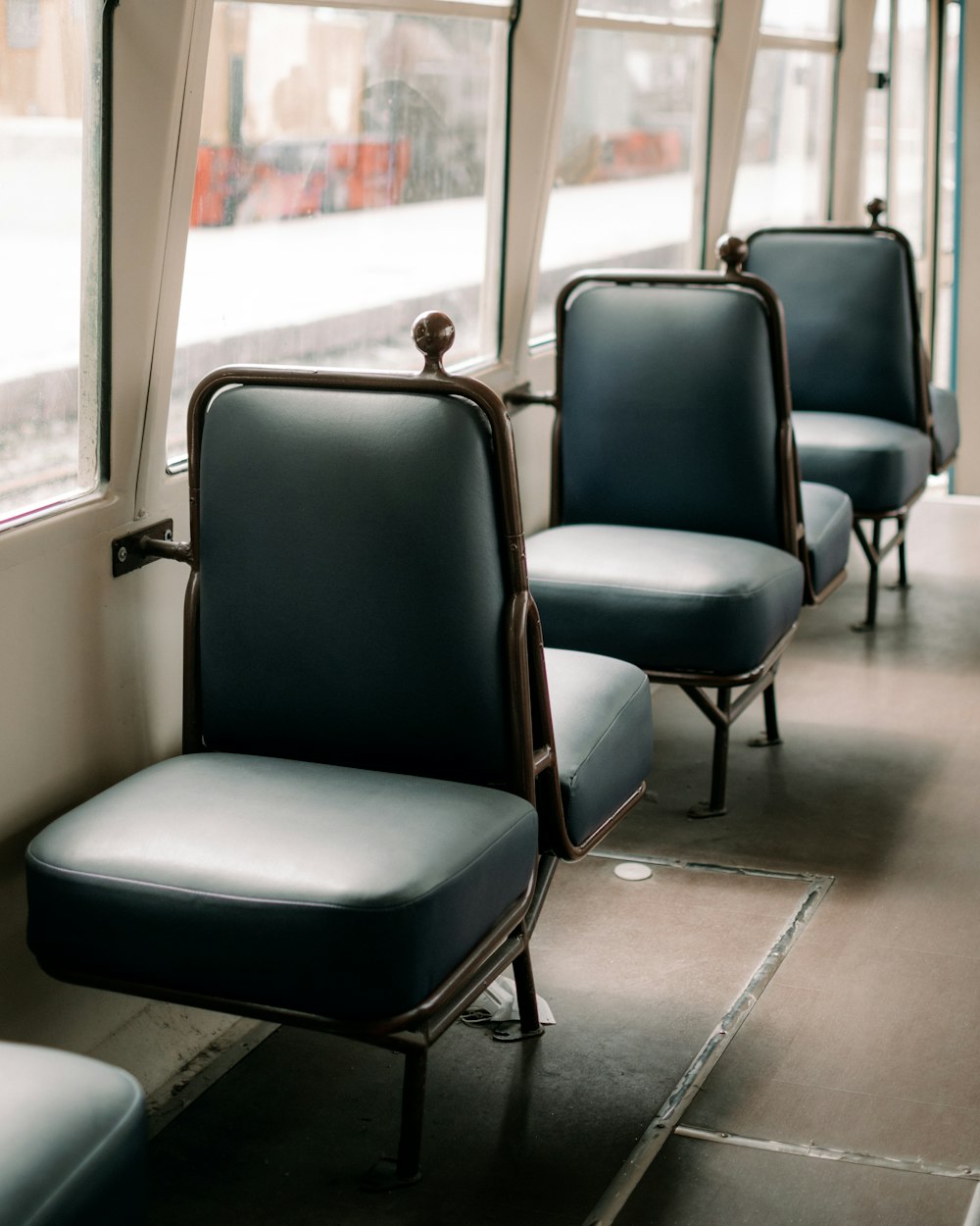 a group of chairs in a train