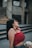 a woman sitting on a bench