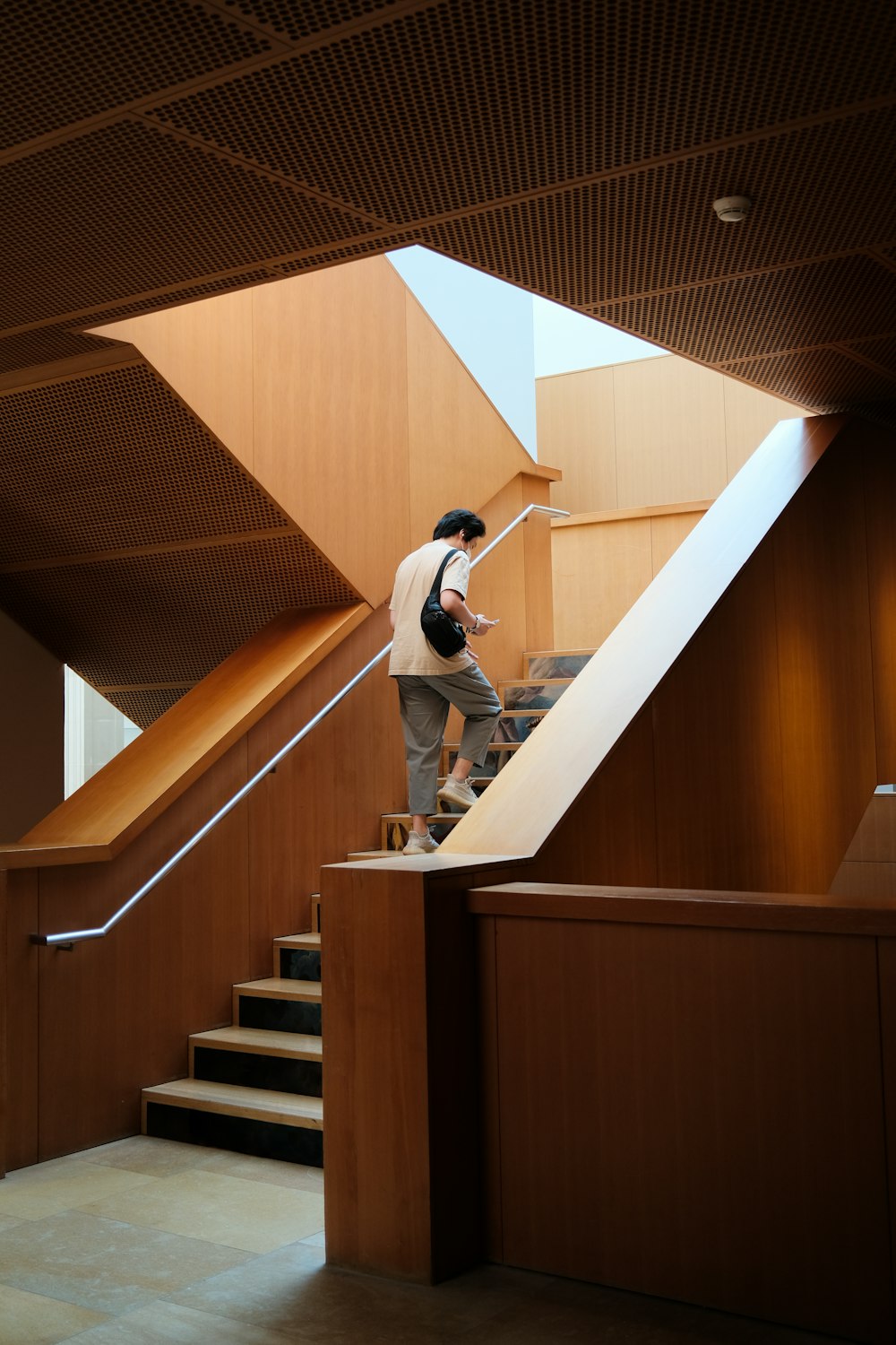 a person riding a skateboard down a flight of stairs