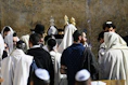 a group of people wearing white robes