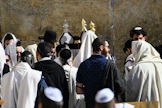 a group of people wearing white robes