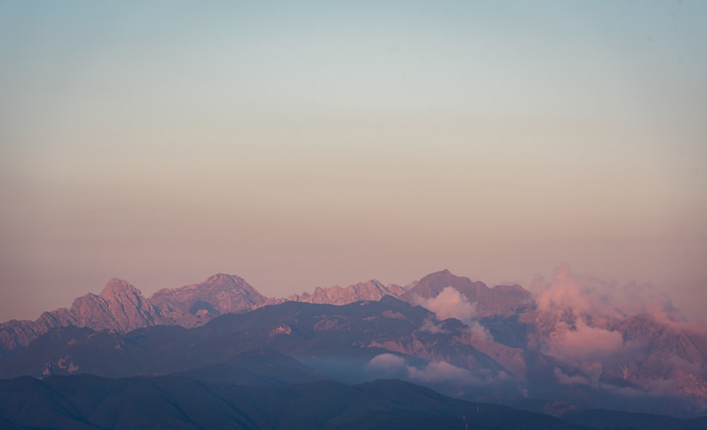 a mountain range with a sunset