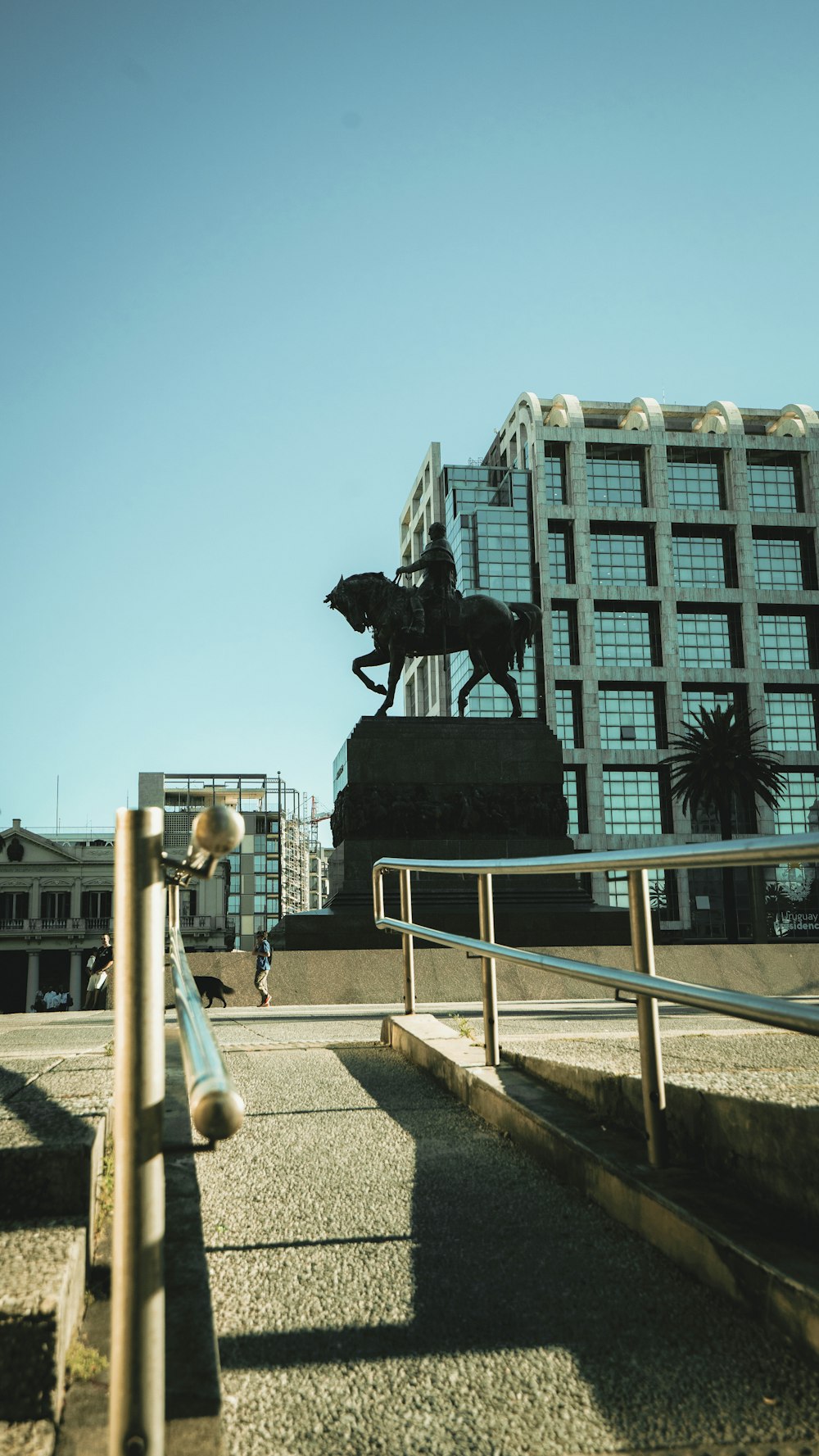 a statue of a person riding a horse