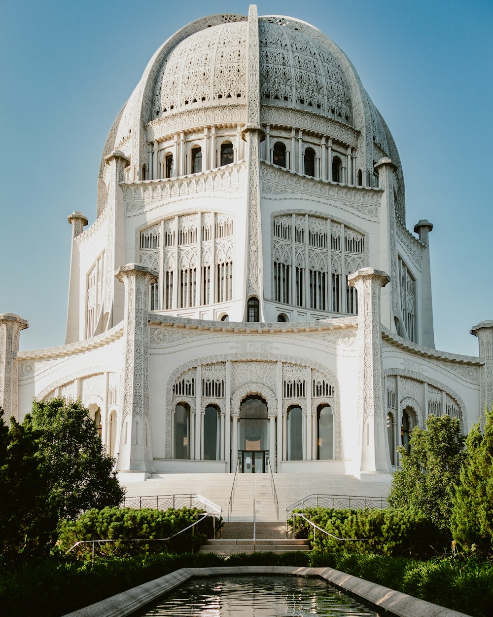 a large white building with a dome