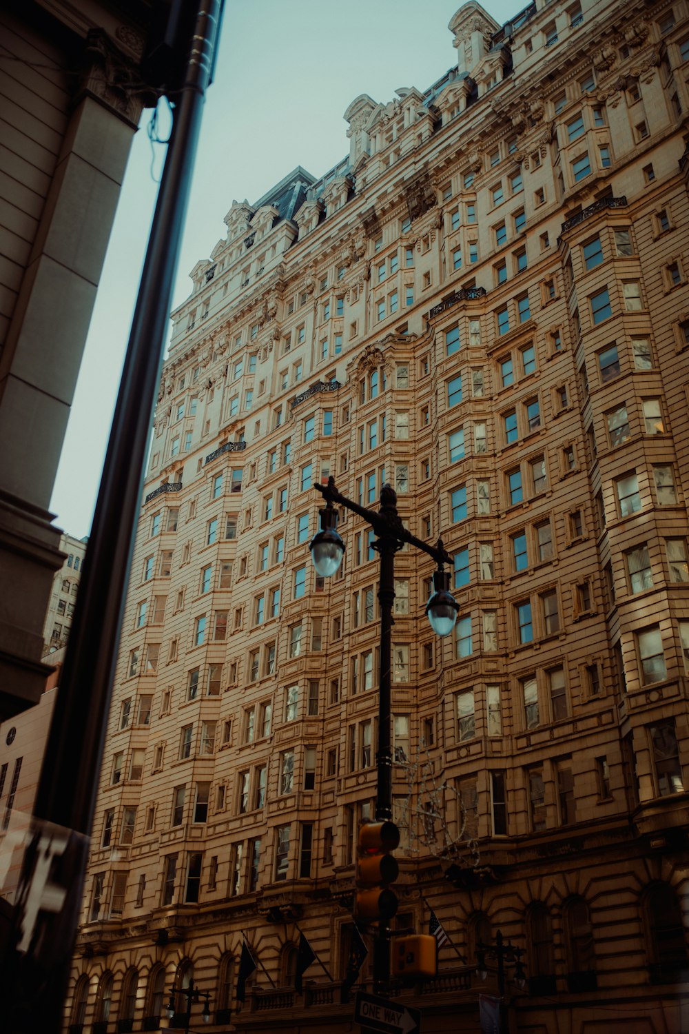 a tall building with a street light