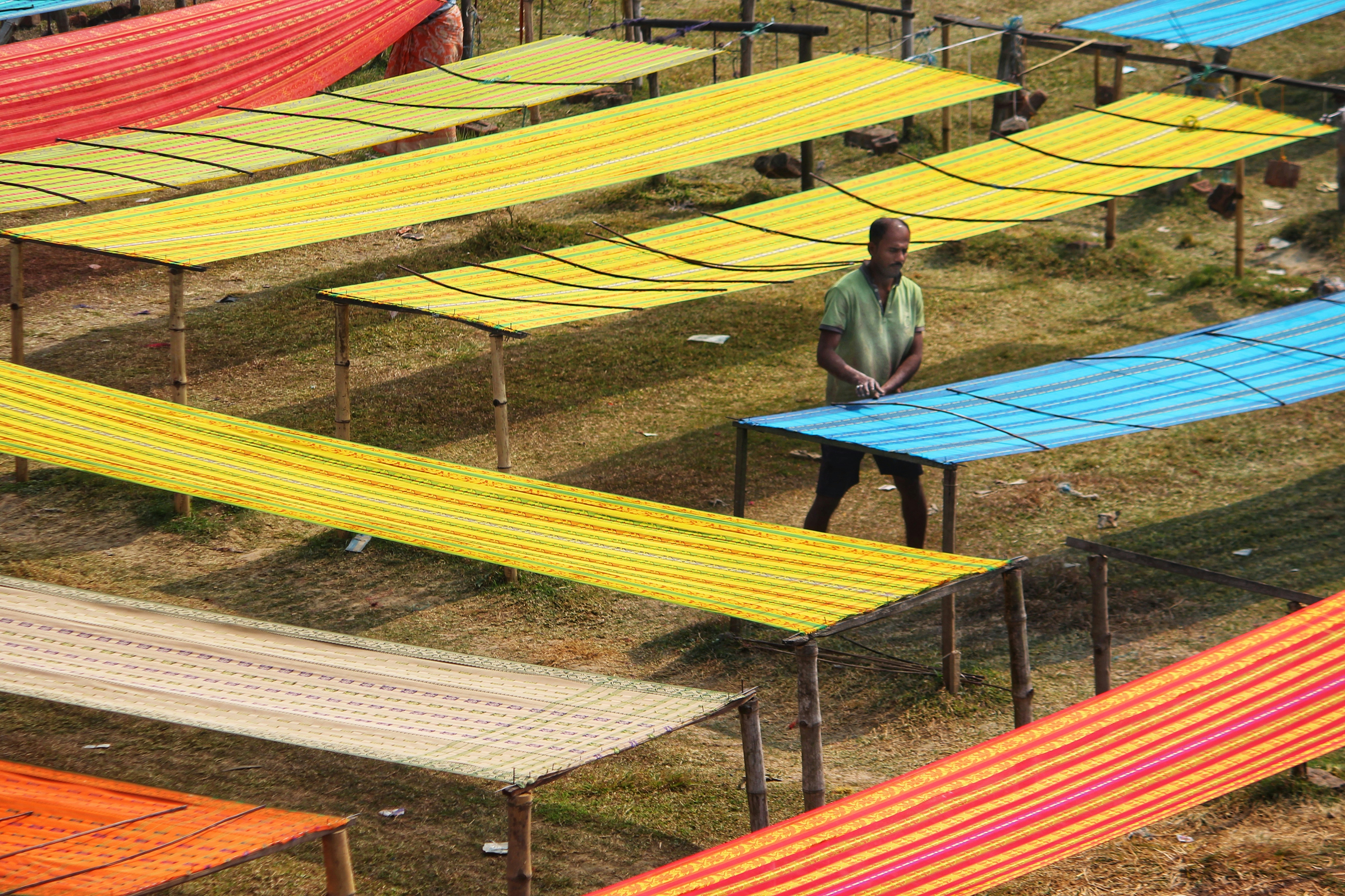 a person standing next to a model airplane