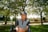 a man sitting in a park