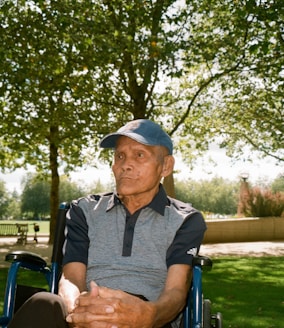 a man sitting in a park