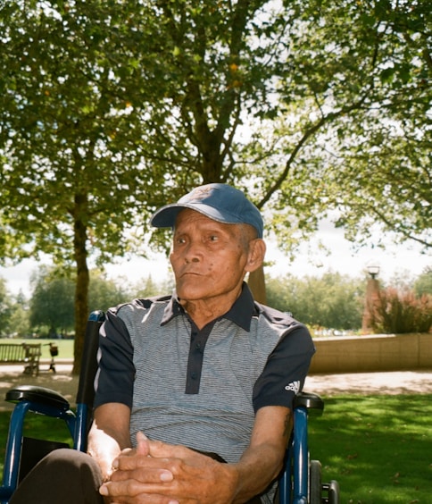 a man sitting in a park