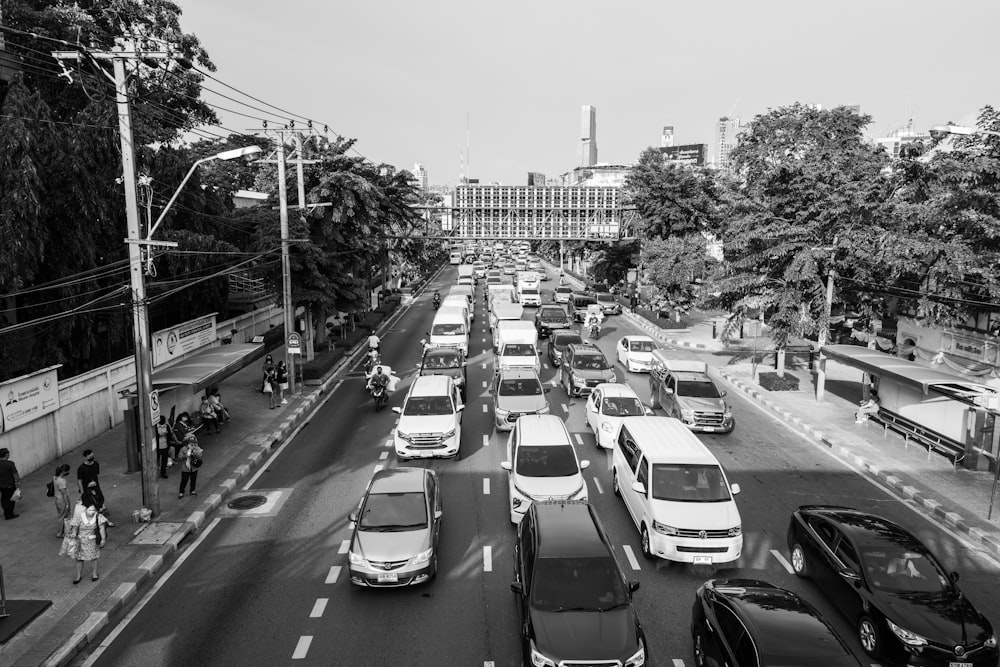 a busy street with cars and people