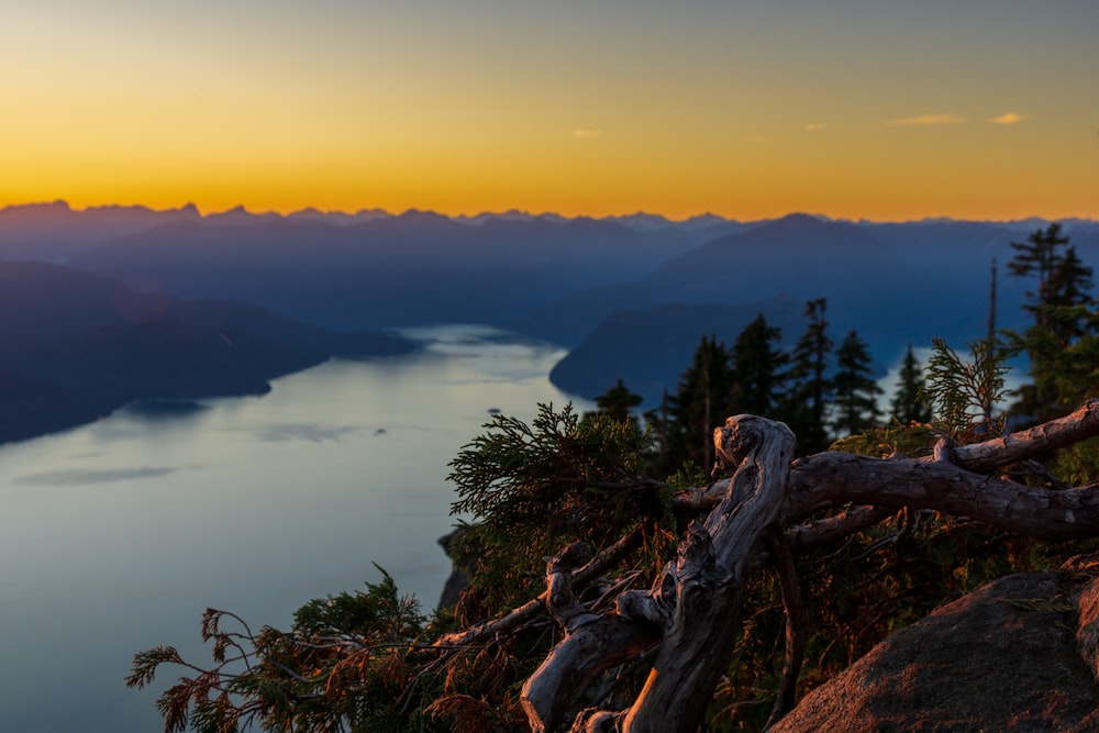 a view of a mountain range and clouds