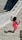 a girl standing on a stone walkway