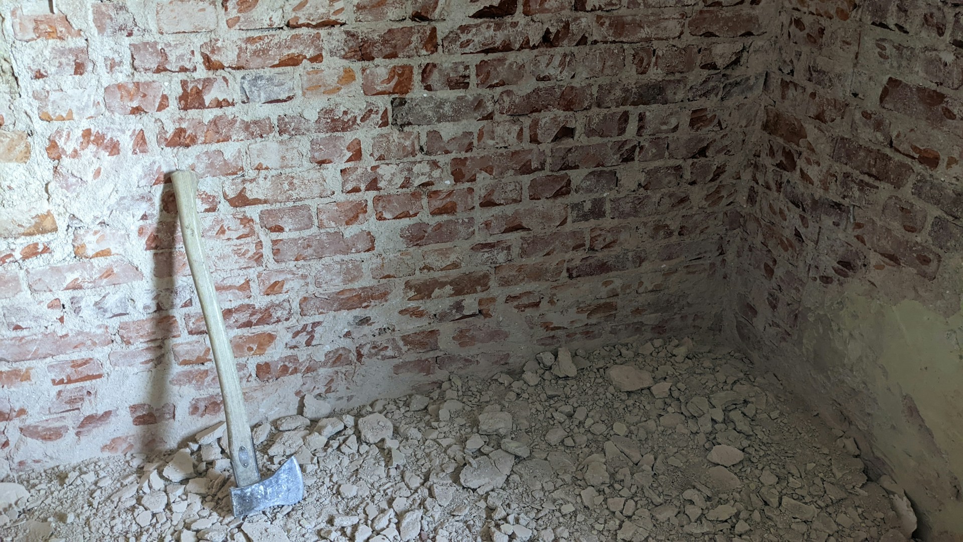 a brick wall with a ladder