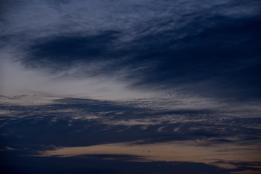 a cloudy sky over a beach