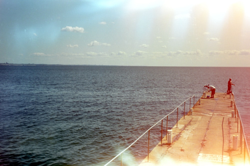 a group of people on a dock