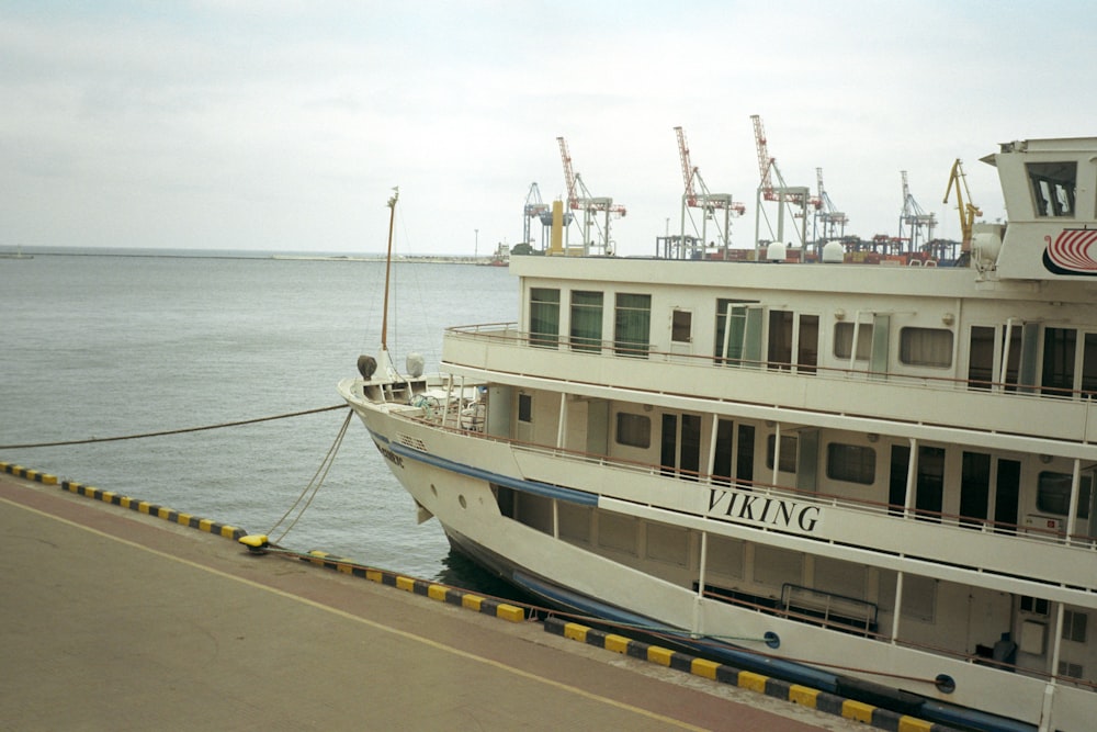 a large white boat on the water