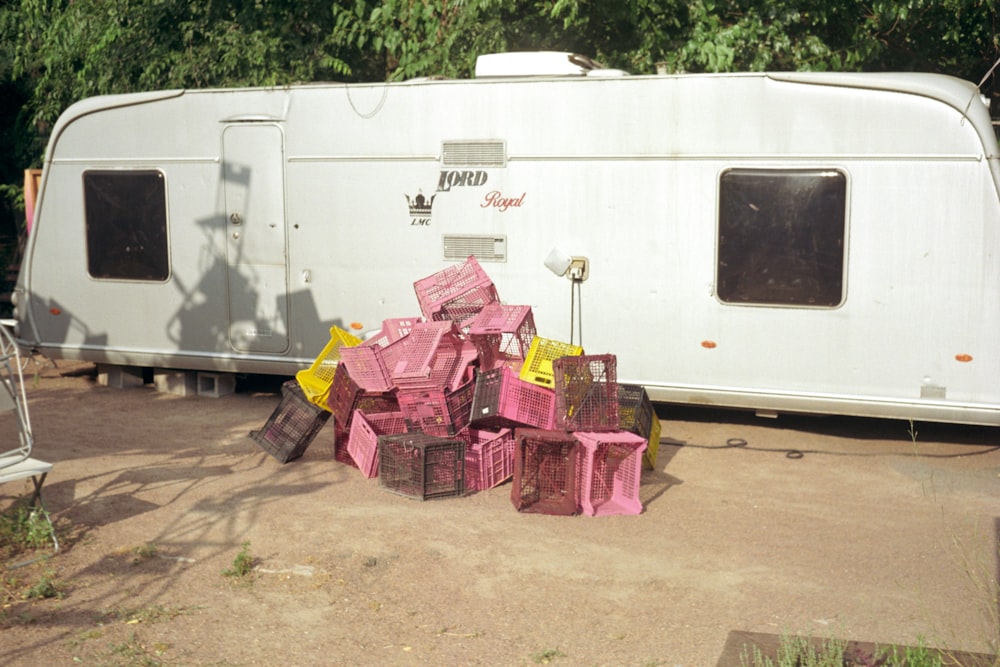 a trailer with a group of crates in front of it