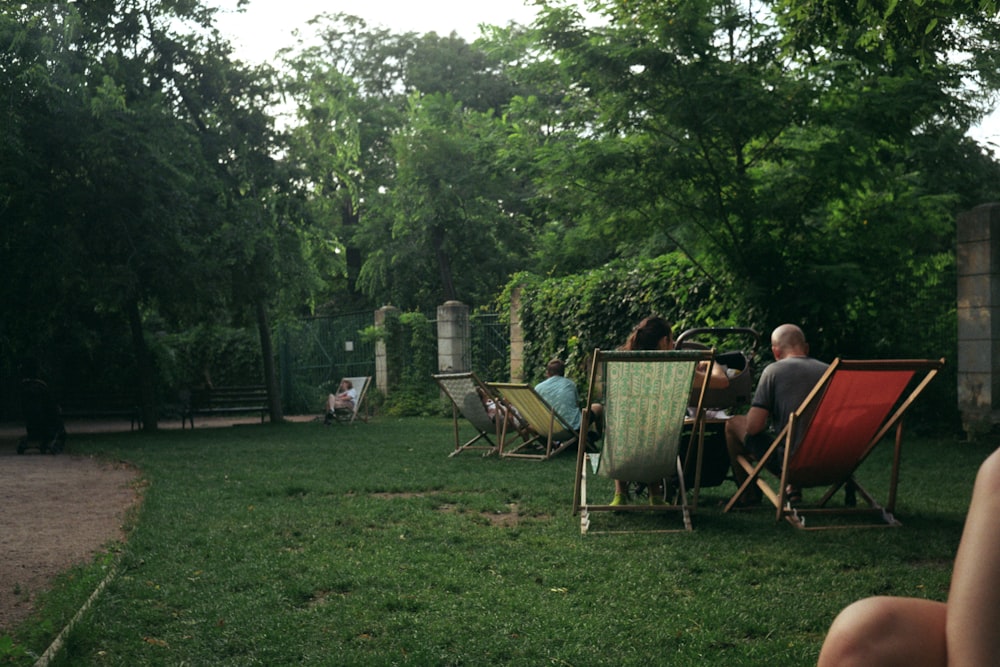 people sitting in chairs outside