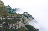 a stone castle on a cliff