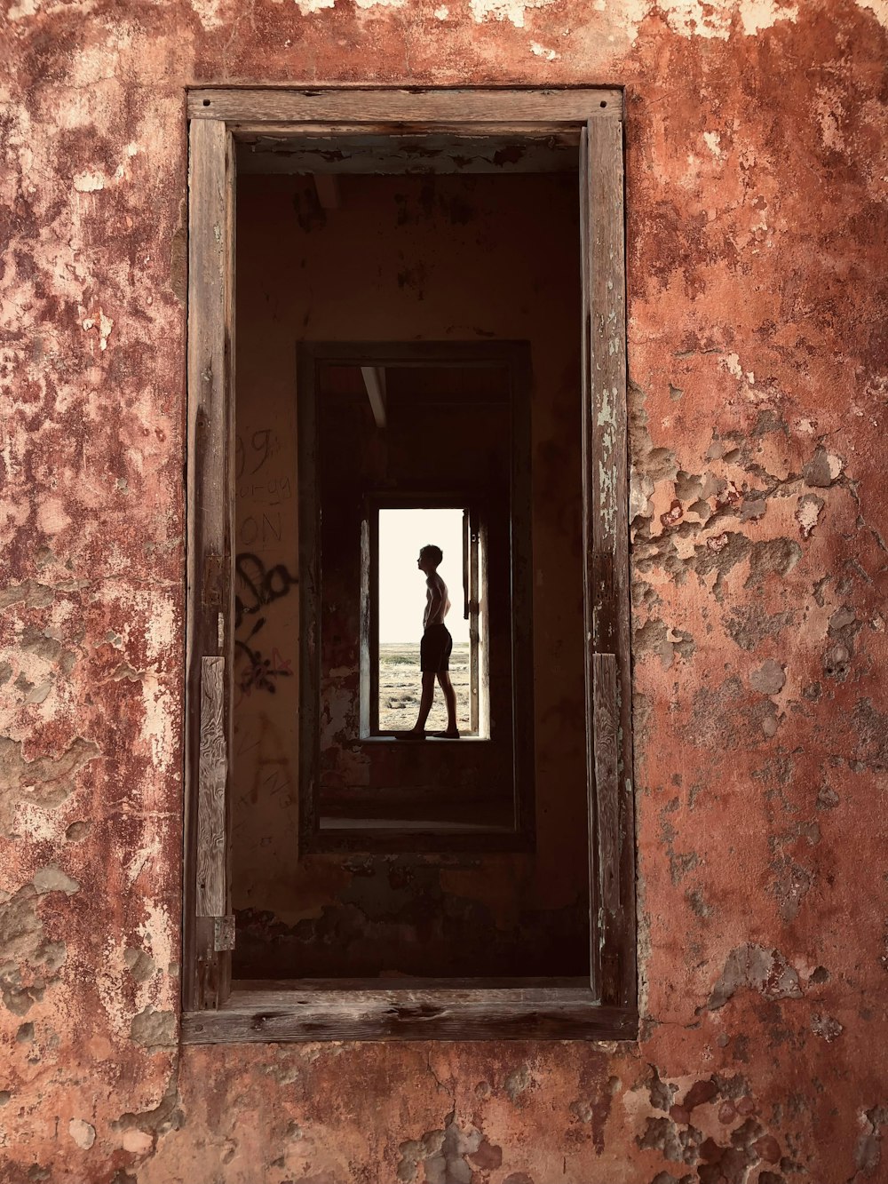 a person standing in a doorway