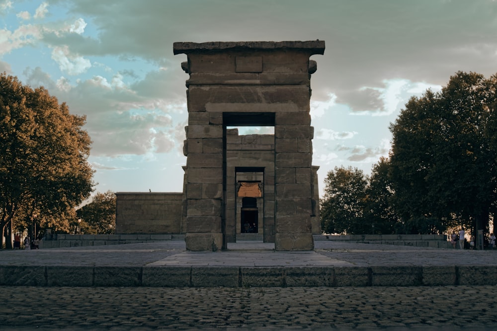 a stone monument with a door