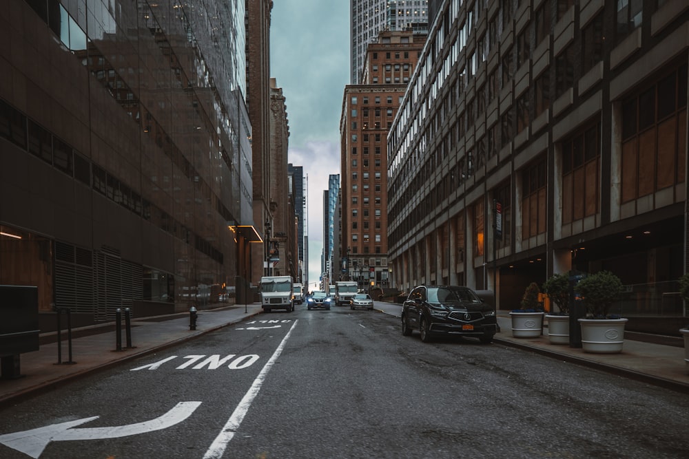 a street with cars and buildings on either side of it