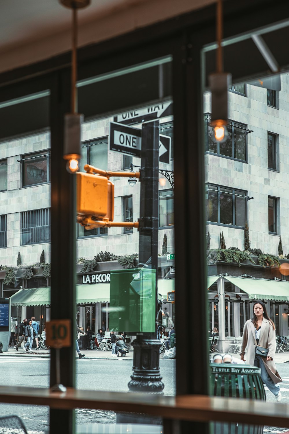 a person walks down a sidewalk