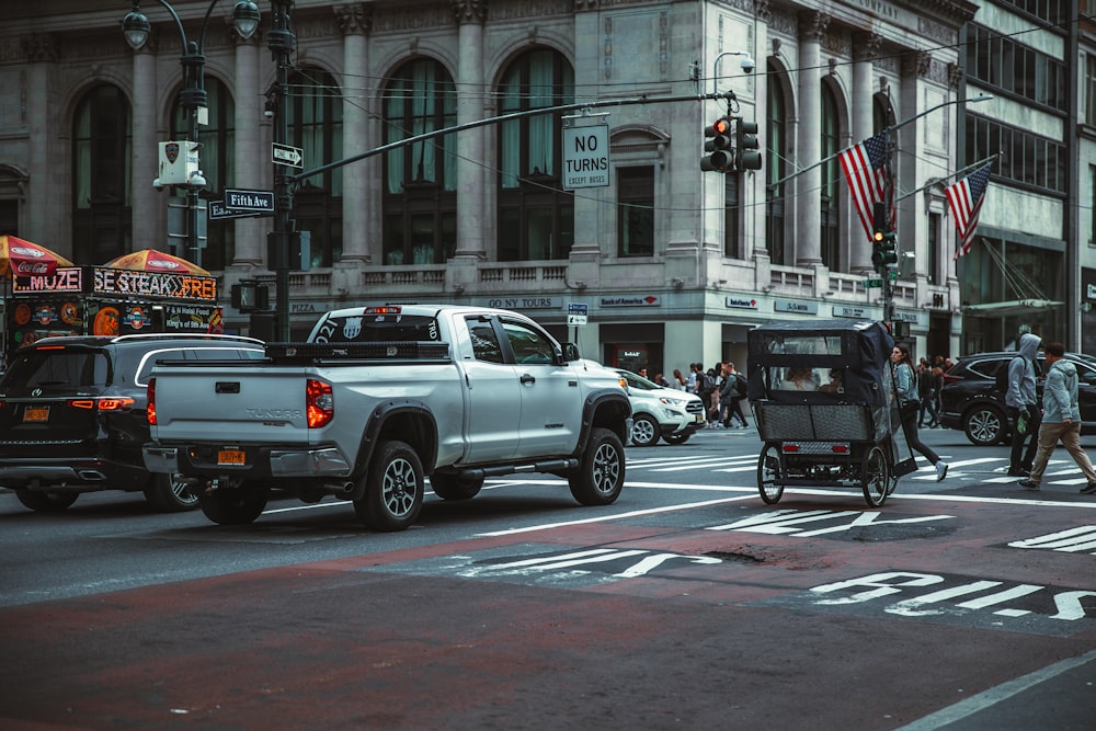 a truck with a carriage on the street