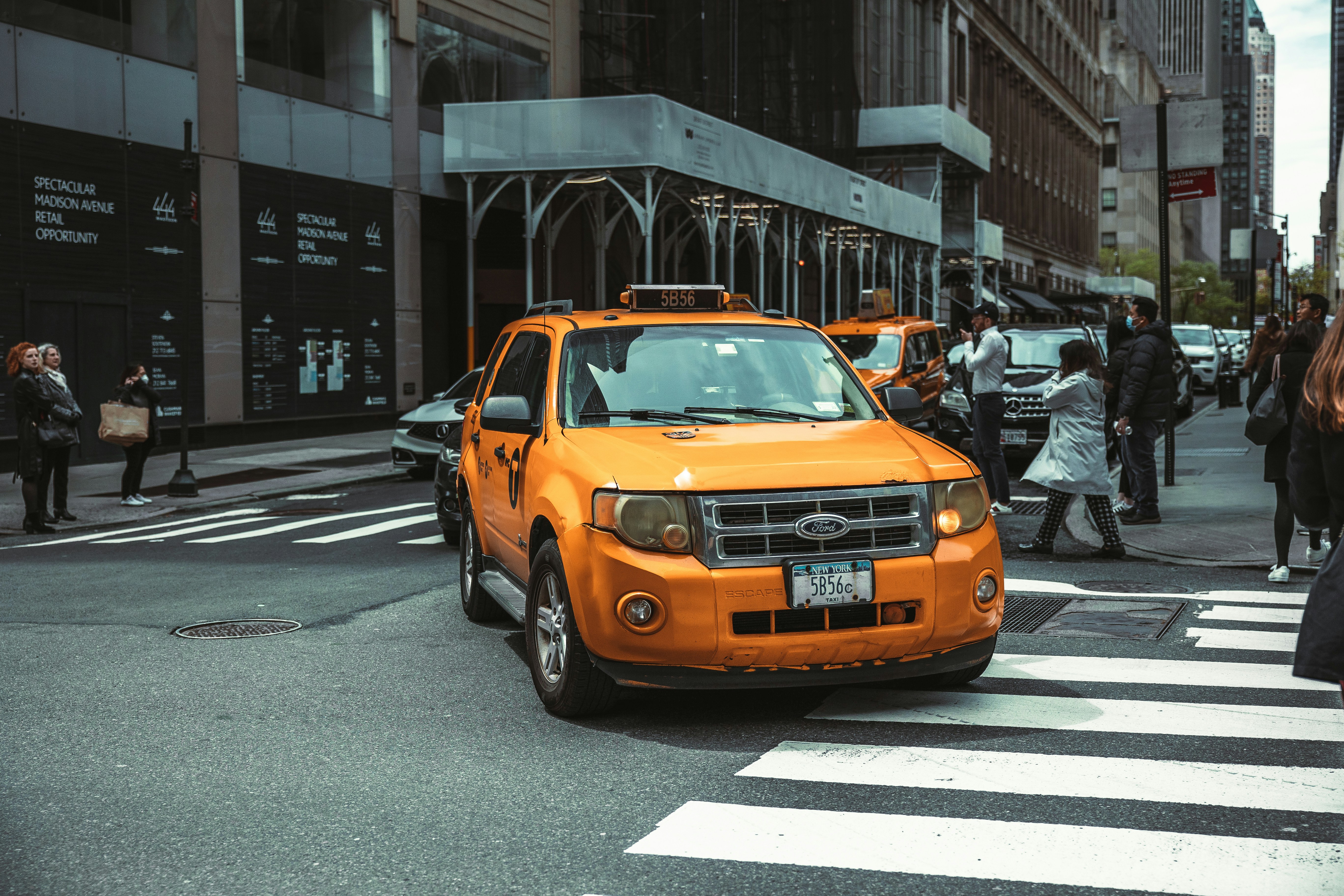 Yellow taxi on street