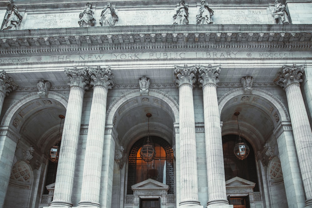 a building with statues on the roof